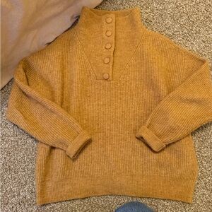 Women’s brown turtleneck sweater